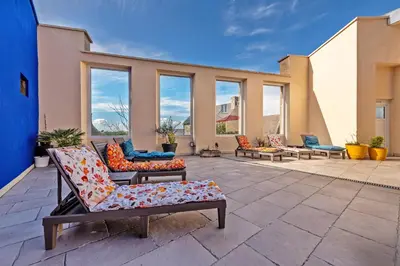 Coin salon dans l'établissement Maison Rioma - Grande maison à 200m de la plage