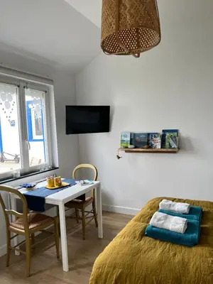 Télévision ou salle de divertissement dans l'établissement Penty de Mézareun