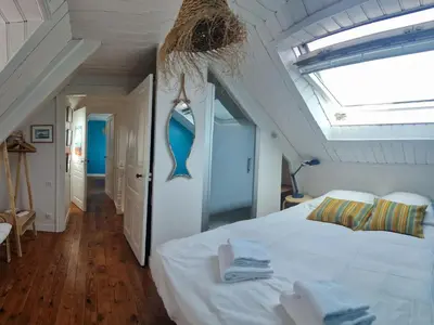 Un ou plusieurs lits dans un hébergement de l'établissement Holiday Home in Primel near Sandy Beach