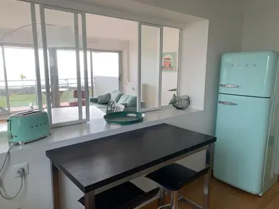 Cuisine ou kitchenette dans l'établissement Rêve - Appartement Terrasse Vue Mer