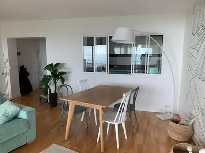 Coin salon dans l'établissement Rêve - Appartement Terrasse Vue Mer