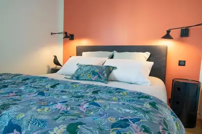 Un ou plusieurs lits dans un hébergement de l'établissement Rêve - Appartement Terrasse Vue Mer