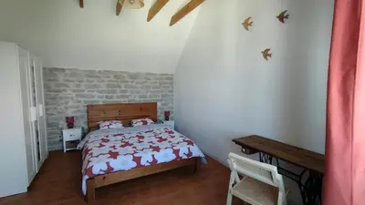 Un ou plusieurs lits dans un hébergement de l'établissement Maison Ker Losa à Saint Guénolé proche plage Pors Carn