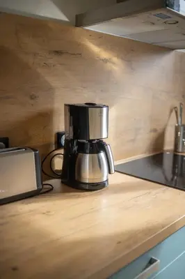 Cuisine ou kitchenette dans l'établissement le cocon urbain