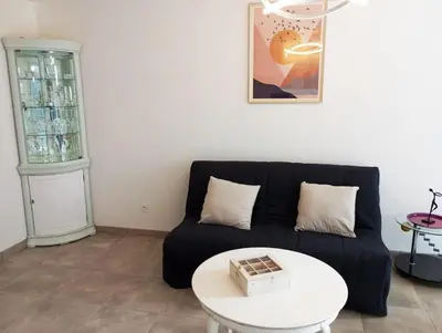Coin salon dans l'établissement Appartement Les Flots d Arthlotte Cabellou Plage