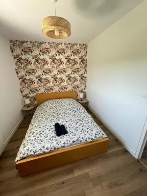 Un ou plusieurs lits dans un hébergement de l'établissement Maison Au Bout Du Pre