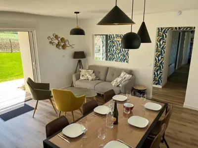 Coin salon dans l'établissement Maison Au Bout Du Pre