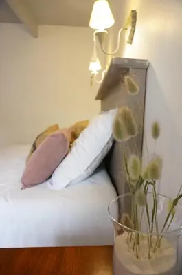 Un ou plusieurs lits dans un hébergement de l'établissement Ma petite maison bretonne