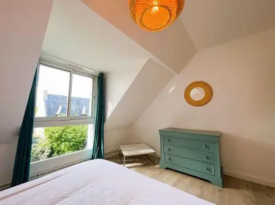 Un ou plusieurs lits dans un hébergement de l'établissement Fouesnant, Cap Coz, superbe maison familiale, plage et sentiers à pied