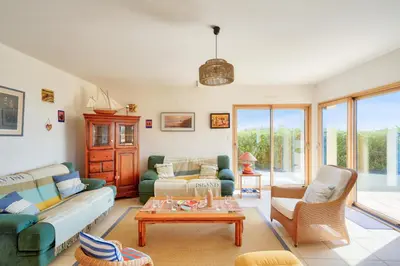 Coin salon dans l'établissement Vue mer ! À 200m de la plage, maison pour 9