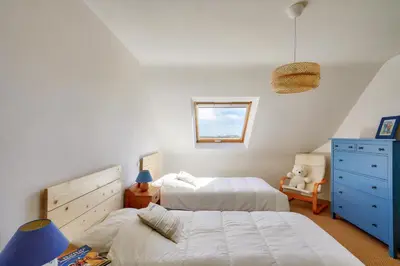 Un ou plusieurs lits dans un hébergement de l'établissement Vue mer ! À 200m de la plage, maison pour 9