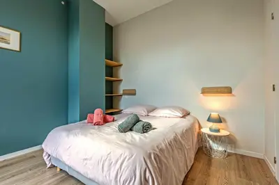 Un ou plusieurs lits dans un hébergement de l'établissement Kelenn - Maison avec jardin et terrasse