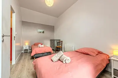 Un ou plusieurs lits dans un hébergement de l'établissement Kelenn - Maison avec jardin et terrasse