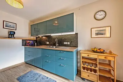 Cuisine ou kitchenette dans l'établissement Kelenn - Maison avec jardin et terrasse