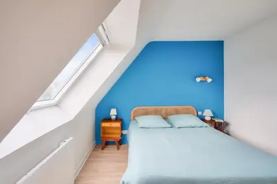Un ou plusieurs lits dans un hébergement de l'établissement Piscine couverte - sauna - Maison pour 9 à Loctudy