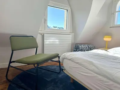 Un ou plusieurs lits dans un hébergement de l'établissement Maison 5 chambres à 150 m de la plage, rénovée, jardin, proche restaurants et commerces - FR-1-481-161