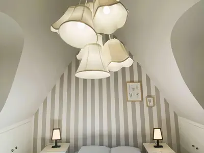 Un ou plusieurs lits dans un hébergement de l'établissement Maison 5 chambres à 150 m de la plage, rénovée, jardin, proche restaurants et commerces - FR-1-481-161