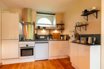 Cuisine ou kitchenette dans l'établissement Le Relais - Maison avec grand jardin