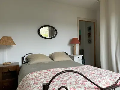 Un ou plusieurs lits dans un hébergement de l'établissement Villa aux roses