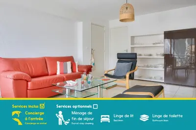 Coin salon dans l'établissement Proche plages et commerces, appartement pour 4