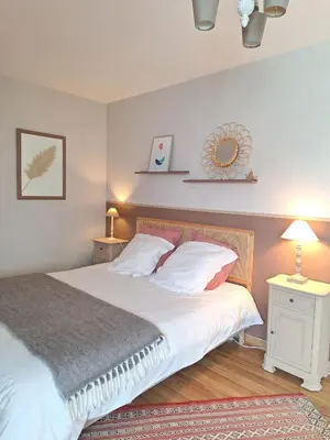 Un ou plusieurs lits dans un hébergement de l'établissement Côté West - Spacieuse Chambre d'Hôtes - Confort, Accueil personnalisé - Petit déjeuner compris