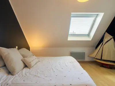 Un ou plusieurs lits dans un hébergement de l'établissement Holiday Home Brign' Beach by Interhome