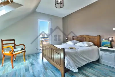 Un ou plusieurs lits dans un hébergement de l'établissement LocaLise - M19 - Ty Mervent - Maison avec jardin clos - A 2 pas de la plage - animaux admis - wifi inclus - draps inclus