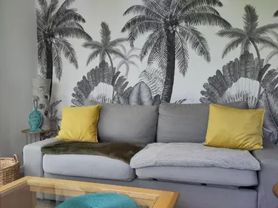 Coin salon dans l'établissement Le 101 - Plage du Dossen à Santec à 1.5 km