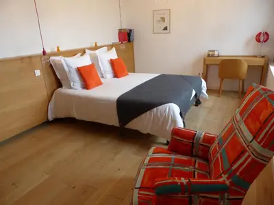 Un ou plusieurs lits dans un hébergement de l'établissement Les Chambres d'hôtes de Kérasquer