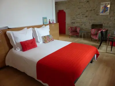 Un ou plusieurs lits dans un hébergement de l'établissement Les Chambres d'hôtes de Kérasquer
