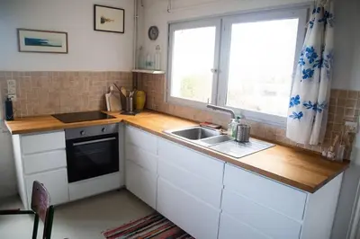 Cuisine ou kitchenette dans l'établissement Maison de pêcheur proche plage et activités