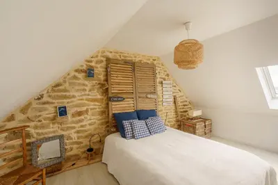 Un ou plusieurs lits dans un hébergement de l'établissement Maison Bretonne - Proche des plages
