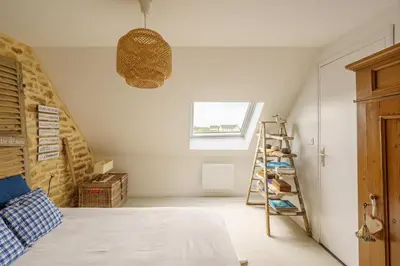 Un ou plusieurs lits dans un hébergement de l'établissement Maison Bretonne - Proche des plages