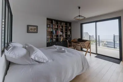 Un ou plusieurs lits dans un hébergement de l'établissement AR SKOL - Magnifique duplex face à la mer