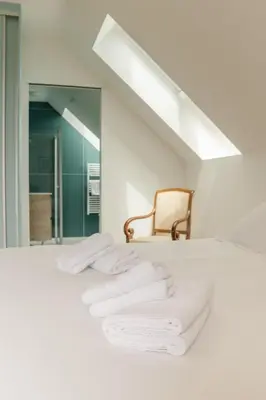 Un ou plusieurs lits dans un hébergement de l'établissement AR SKOL - Magnifique duplex face à la mer