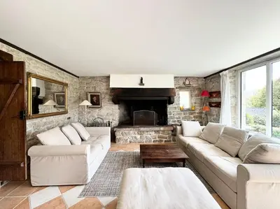 Coin salon dans l'établissement La Ferme, spacieuse maison tout confort, Bénodet