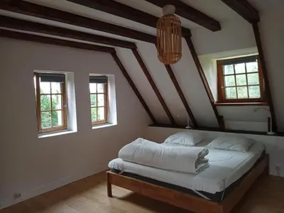Un ou plusieurs lits dans un hébergement de l'établissement Petit gîte du Manoir de Keryvoas