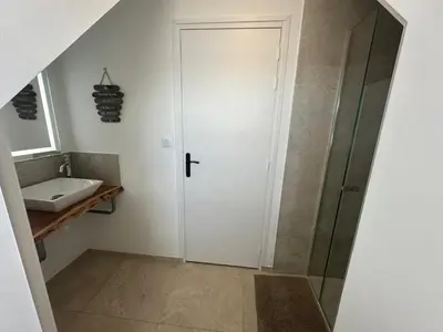 Salle de bains dans l'établissement Villa les dunes