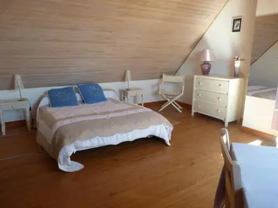 Un ou plusieurs lits dans un hébergement de l'établissement 303 La Villa Courlis Les pieds dans l eau