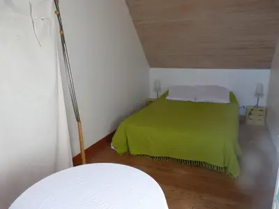 Un ou plusieurs lits dans un hébergement de l'établissement 303 La Villa Courlis Les pieds dans l eau