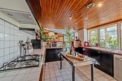 Cuisine ou kitchenette dans l'établissement Maison Aubépines -Jolie maison avec piscine privée