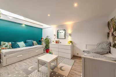 Coin salon dans l'établissement Maison Aubépines -Jolie maison avec piscine privée