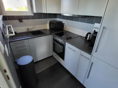 Cuisine ou kitchenette dans l'établissement 714-Ker Tiny a 300m de la mer et du GR34