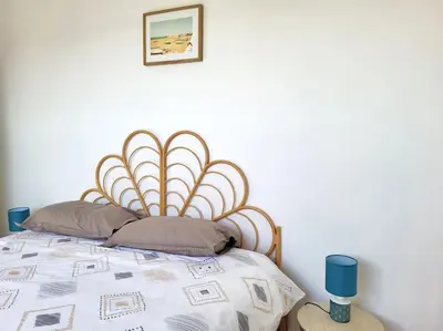 Un ou plusieurs lits dans un hébergement de l'établissement Cosy /Calme /Accueil chaleureux