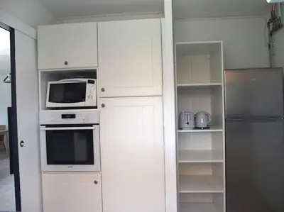 Cuisine ou kitchenette dans l'établissement Jolie maison, 8 vacanciers, à 900 m de la mer