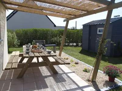Jardin de l'établissement Jolie maison, 8 vacanciers, à 900 m de la mer