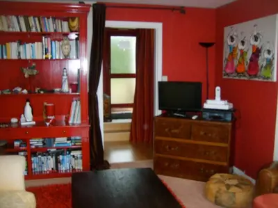 Télévision ou salle de divertissement dans l'établissement un amour de maison
