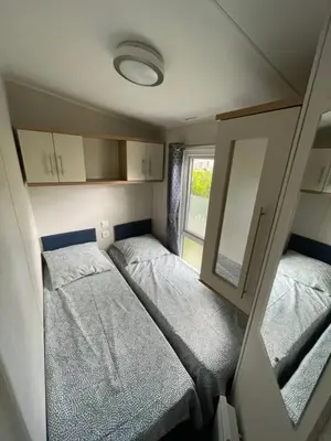 Un ou plusieurs lits dans un hébergement de l'établissement Mobilhome 6 pers - 3 Ch-terrasse- Domaine de Kerlann