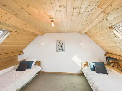 Un ou plusieurs lits dans un hébergement de l'établissement À 200m de la plage de Langoz - Maison pour 10