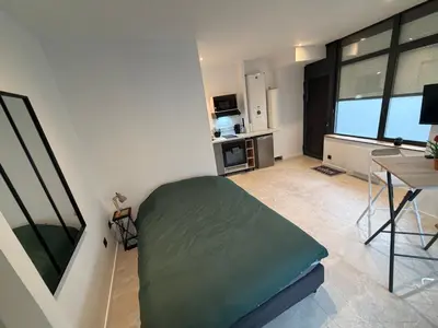 Télévision ou salle de divertissement dans l'établissement Brest Centre Studio